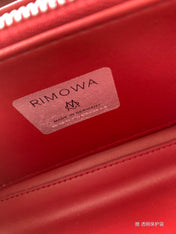 RIMOWA 20 CASE BAG IN LIGHT PINK ALUMINUM MAGNESIUM
