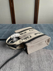 SMALL STRAP WOODY TOTE BAG 26.5 IN BEIGE LINEN CANVAS BLACK WEBBING LOGO EMBROIDER BLACK CALFSKIN