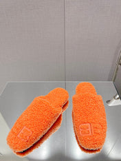 BALENCIAGA 25S MULES IN ORANGE WOOL WITH LOGO