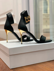BALMAIN 25S THIN STRAP HIGH HEELS 105MM IN BLACK CALFSKIN GOLD HARDWARE