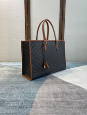 CELINE 25S HORIZONTAL CABAS 43MM IN BLACK TRIOMPHE CANVAS AND TAN BROWN CALFSKIN