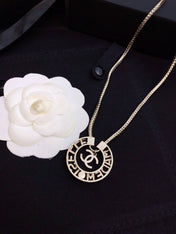 CHANEL 26S CHANEL CC LOGO MADEMOISELLE ROUND NECKLACE IN GOLD METAL 633322