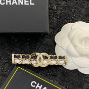 CHANEL 26S DOUBLE C LOGO CHAIN WEAVE BAR HAIR CLIP IN BLACK & WHITE LEATHER AND GOLD METAL 629927