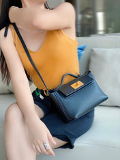 MINI 24/24 21CM IN BLACK EVERCOLOR CALFSKIN GOLD KELLY BUCKLE