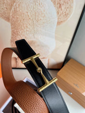 HM JUMBO BELT BUCKLE & REVERSIBLE CIDER ORANGE AND BLACK LEATHER STRAP 38 MM GOLD HARDWARE