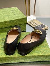 BLONDIE LOGO-PLAQUE LOAFERS IN BLACK CALFSKIN WITH GOLD HARDWARE