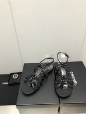 FLORAL FLAT SANDAL IN BLACK LAMBSKIN