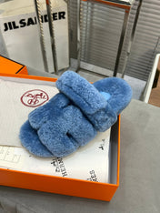 CHYPRE SLIPPERS IN AZURE BLUE LAMB WOOL