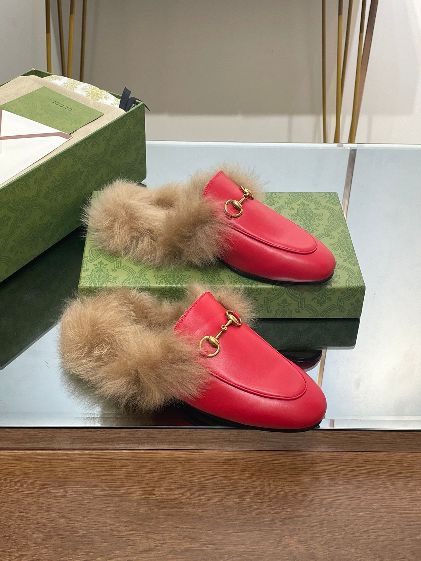 HORSEBIT MULE IN CHERRY RED CALFSKIN AND LAMB WOOL LINING