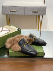 HORSEBIT MULE IN BLACK CALFSKIN AND LAMB WOOL LINING