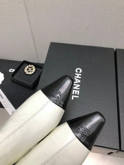 SHORT BOOTS IN WHITE MIX BLACK SHEEPSKIN