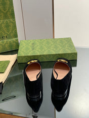 BLONDIE LOGO-PLAQUE LOAFERS IN BLACK SUEDE WITH GOLD HARDWARE