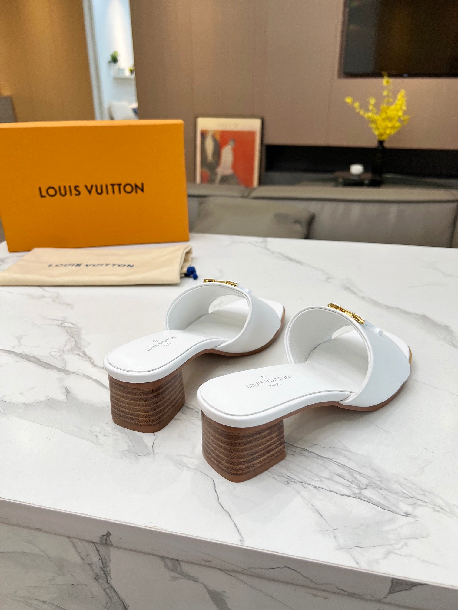 LV 26S CAPRI HIGH-HEELED MULES IN WHITE CALFSKIN