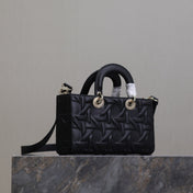 LADY D-JOY BAG 26 IN BLACK GRAPHIC CANNAGE CALFSKIN PALE GOLD-FINISH METAL CHARMS
