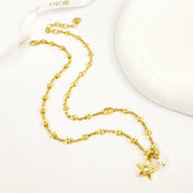 CD 26S STAR CHAIN PEARL PENDANT NECKLACE IN GOLD TONE METAL 631051