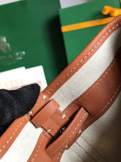 PETIT FLOT BUCKET BAG 22 IN BLACK GOYARDINE CANVAS AND TAN LAMBSKIN TRIM