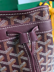 PETIT FLOT BUCKET BAG 22 IN WINE RED GOYARDINE CANVAS AND LAMBSKIN TRIM