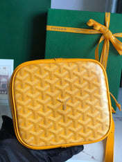 PETIT FLOT BUCKET BAG 22 IN YELLOW GOYARDINE CANVAS AND LAMBSKIN TRIM
