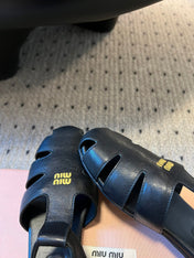 MIUMIU 26S FISHERMAN SANDALS IN BLACK RUCHES NAPPA CALFSKIN
