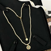 CD 26S CD LOGO PEARL BEADED MEDALLION PENDANT NECKLACE IN GOLD METAL