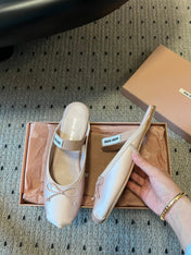 MIUMIU 26S BALLET MULES IN LIGHT PINK SATIN WITH BOW