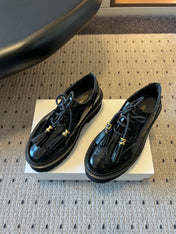 CELINE 26S SAINTNJORD TASSEL LOAFER 50 MM IN BLACK CALFSKIN