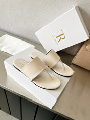 THE ROW 26S FLAT THONG SANDALS IN WHITE CALFSKIN