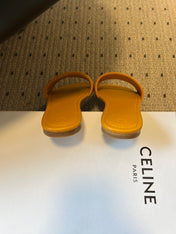 CELINE 26S FLAT SLIDES IN HONEY YELLOW LAMBSKIN