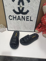 CHANEL 26S QUILTED SLIDE SANDALS IN BLACK CALFSKIN