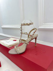 VALENTINO 26S ROCKSTUD CAGED SANDALS IN POWDER PINK CALFSKIN LEATHER