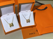 HM CLIC YELLOW ENAMEL GOLD NECKLACE