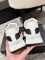 PRADA 25S MEN SNEAKERS IN BLACK AND WHITE CANVAS