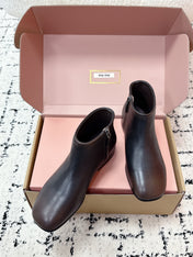 MIUMIU 26S BOOTIES IN DARK BROWN  FUME CALFSKIN