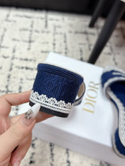 DIOR 26S HIGH HEEL SLIDES IN NAVY BLUE EMBOSSED OBLIQUE LACE EMBROIDERY
