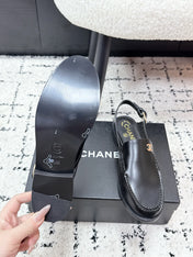 CHANEL 26S SLINGBACK LOAFERS IN BLACK PATENT CALFSKIN WITH CC LOGO