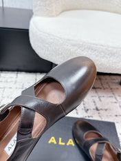 ALAIA 26S CROSS-STRAP BALLET FLATS IN DARK BROWN LAMBSKIN