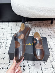 ALAIA 26S CROSS-STRAP BALLET FLATS IN DARK BROWN LAMBSKIN
