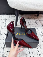 ALAIA 26S POINTED-TOE HEELS 90 MM IN DARK RED PATENT CALFSKIN