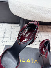 ALAIA 26S POINTED-TOE HEELS 90 MM IN DARK RED PATENT CALFSKIN