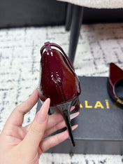 ALAIA 26S POINTED-TOE HEELS 90 MM IN DARK RED PATENT CALFSKIN