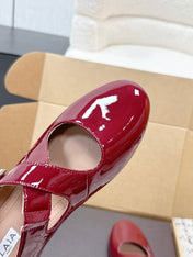 ALAIA 26S CROSS-STRAP BALLET FLATS IN RED GLOSSY LAMBSKIN