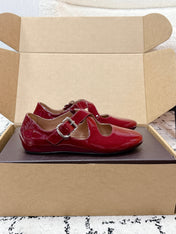 ALAIA 26S CROSS-STRAP BALLET FLATS IN RED GLOSSY LAMBSKIN