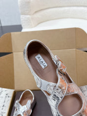 ALAIA 26S CROSS-STRAP BALLET FLATS IN SILVER LAMBSKIN
