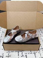 ALAIA 26S CROSS-STRAP BALLET FLATS IN SILVER LAMBSKIN