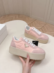 PRADA 26S PLATFORM SNEAKERS 50MM IN BLUSH PINK NYLON AND SUEDE