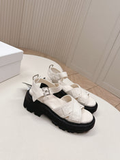 PRADA 26S CROSS STRAP CHUNKY SOLE SANDALS IN WHITE CANVAS