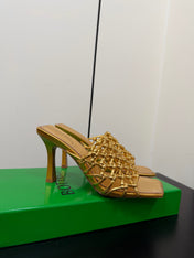 BOTTEGA VENETA 26S WOVEN STRAP HIGH-HEEL SANDALS 85 MM IN GOLD LAMBSKIN