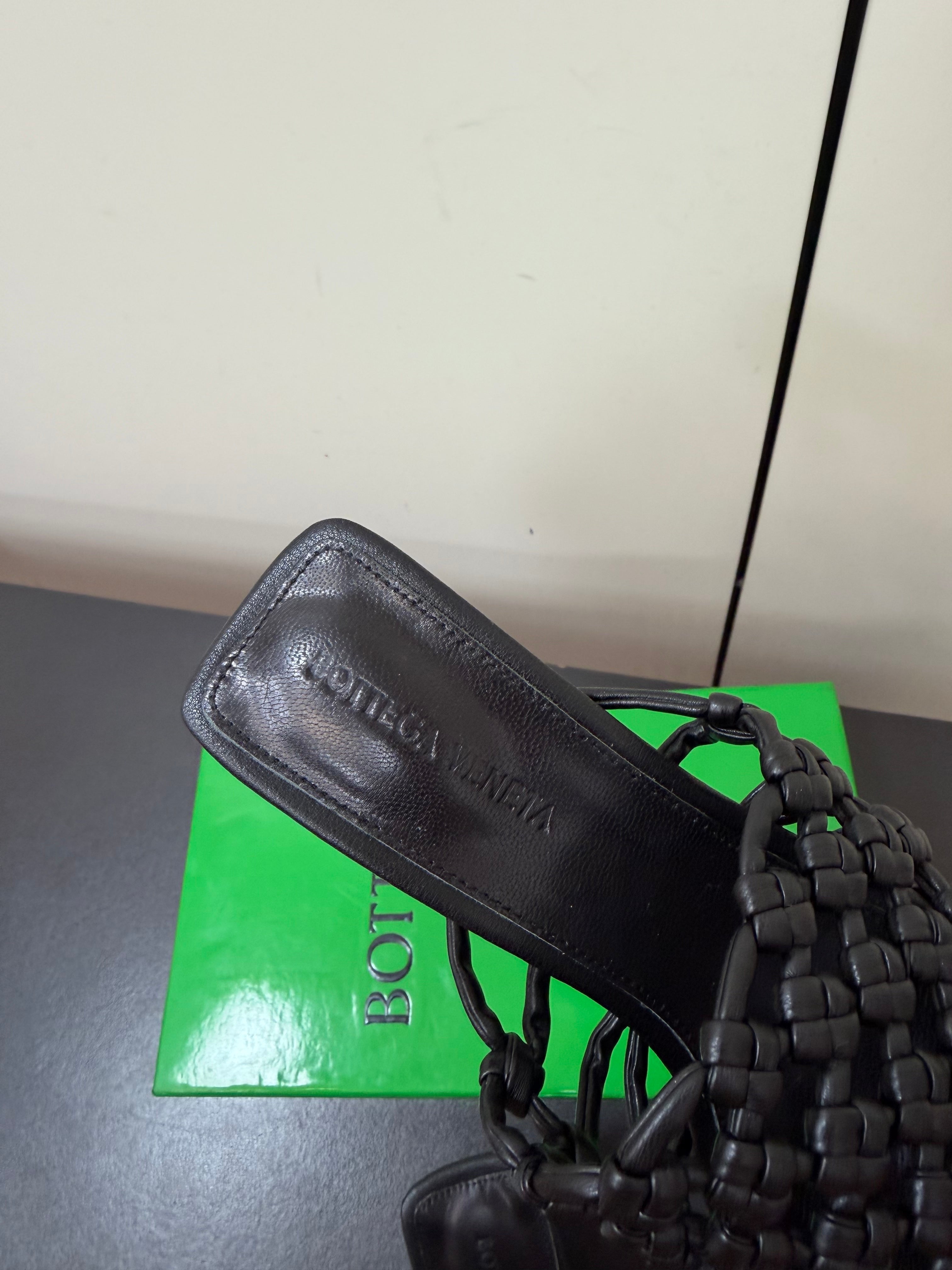 BOTTEGA VENETA 26S WOVEN STRAP HIGH-HEEL SANDALS 85 MM IN BLACK LAMBSKIN