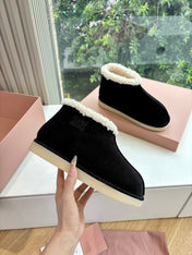 MIUMIU 26S ANKLE BOOTS IN BLACK SUEDE AND SHEARLING