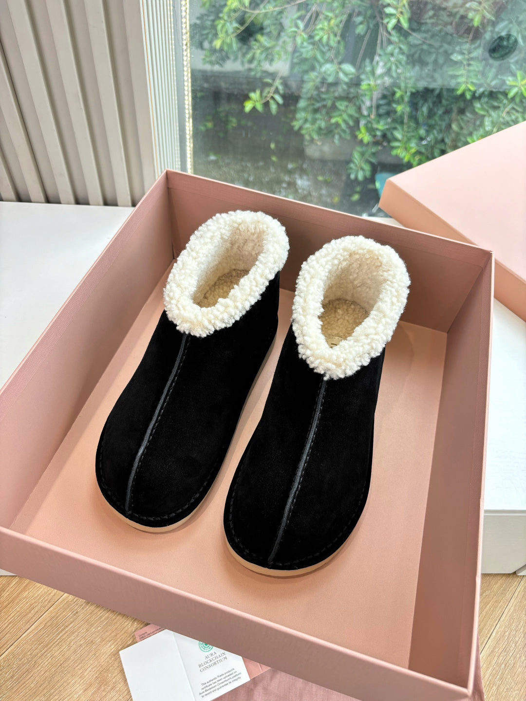 MIUMIU 26S ANKLE BOOTS IN BLACK SUEDE AND SHEARLING